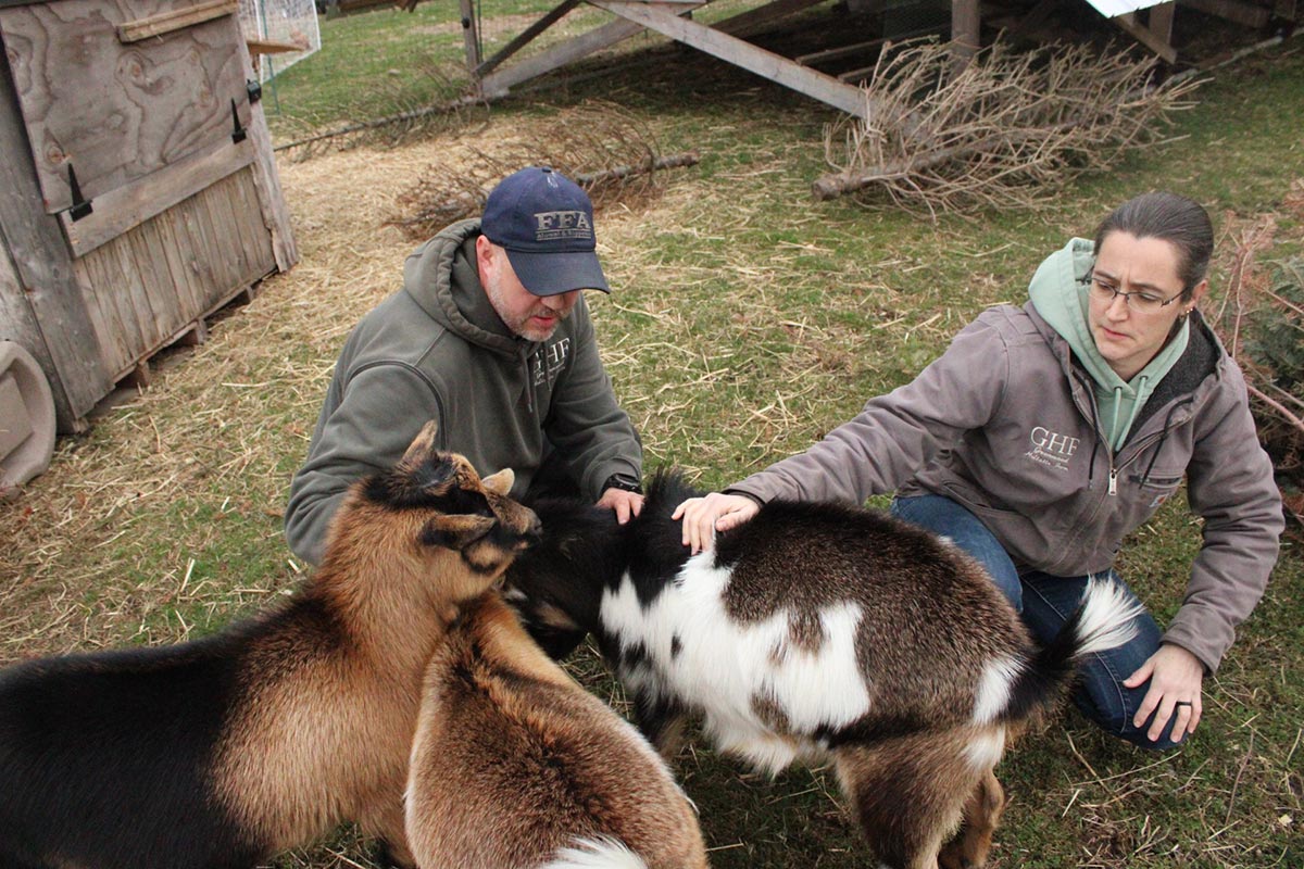 farmers with goats