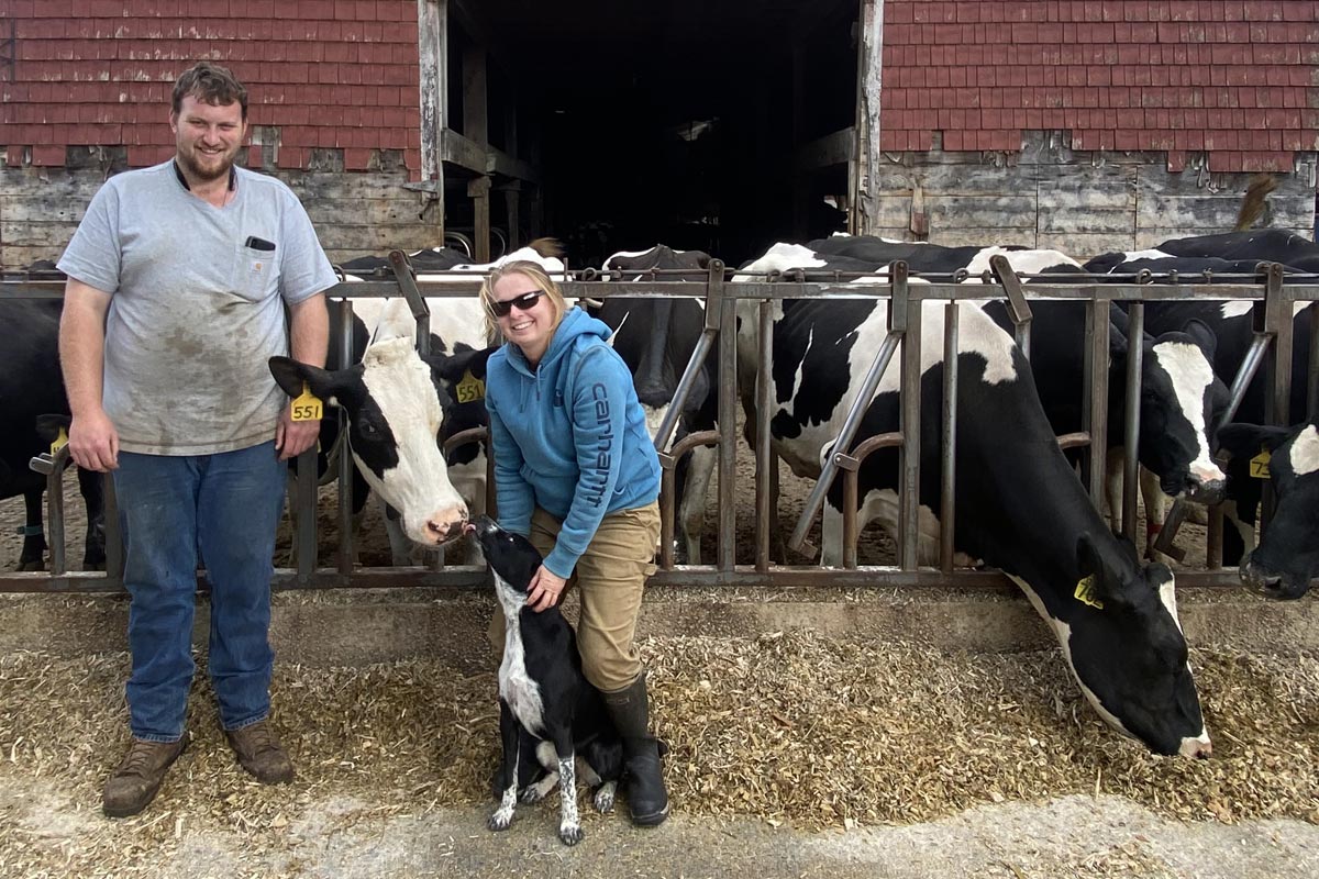Kies, Jared, with dog and cows in front of a barn